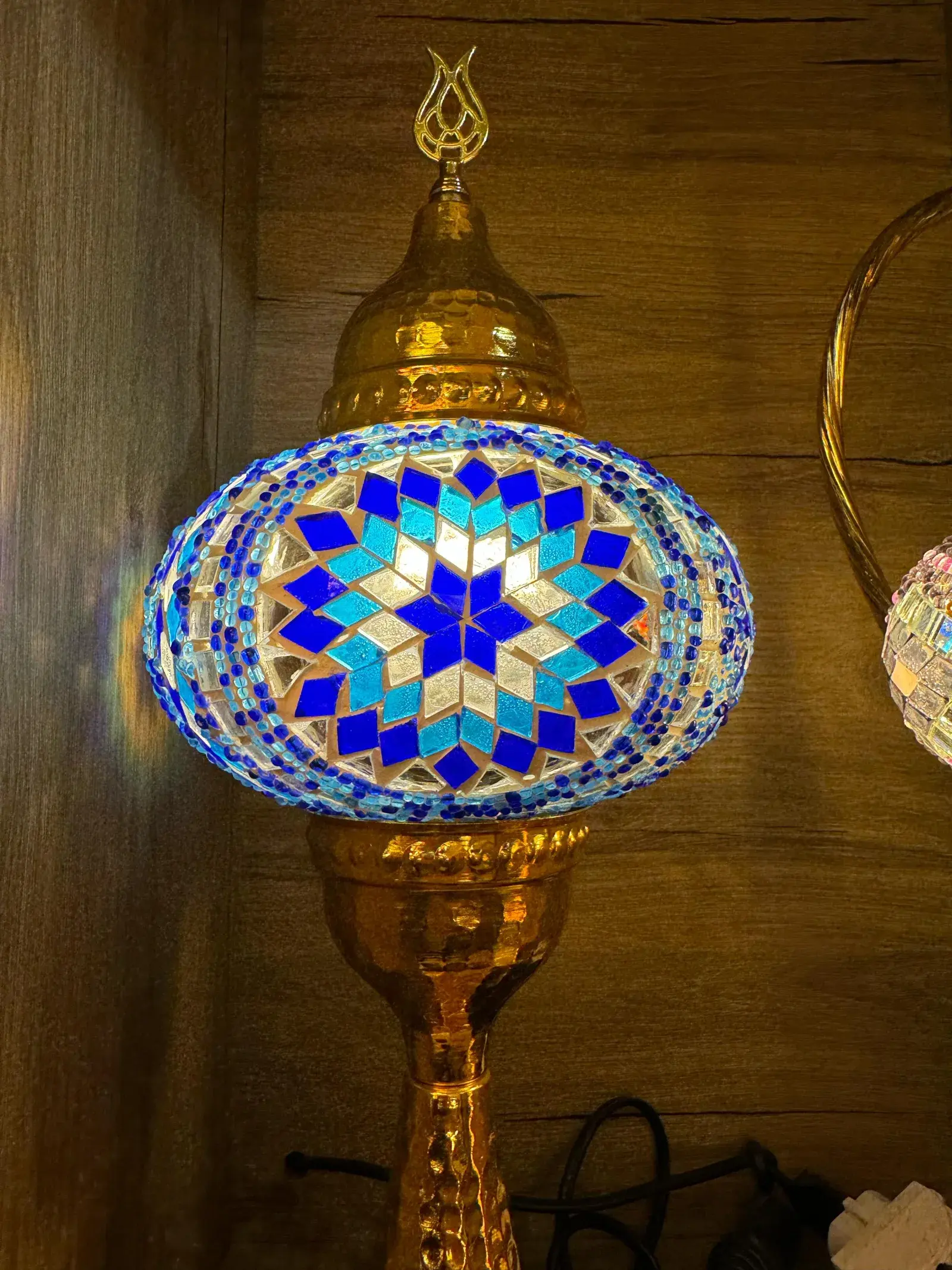 Large cobalt-blue mosaic lamp on a hammered gold base, made in our Balat workshop